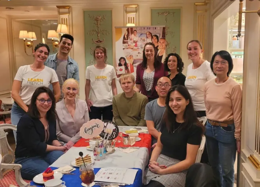 Vancouver students who study french comedians and stand-up as listening practice, laughing at a community evening