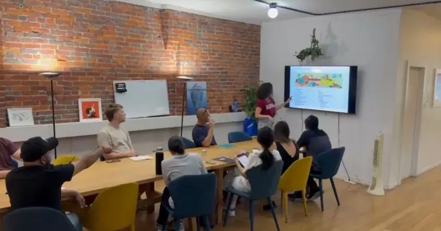 French teacher explaining TEF and TCF compréhension écrite strategies to students in a Vancouver classroom