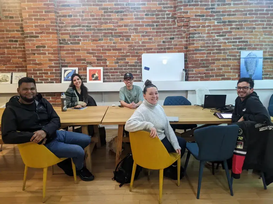 TEF TCF expression écrite, small group French writing class with whiteboard at Learn French in Vancouver