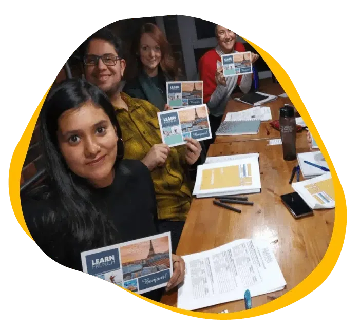 French learners reading together at Learn French in Vancouver, small group classes in Vancouver