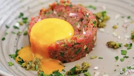 Steak tartare: the boldest of classic French dishes, seasoned raw beef