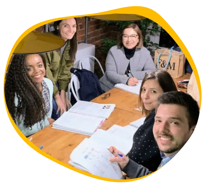 French class preparing job seekers for a job in quebec, small group with native teacher