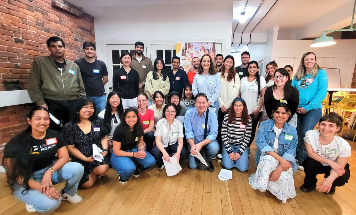 Learn French students together at a community event in Vancouver